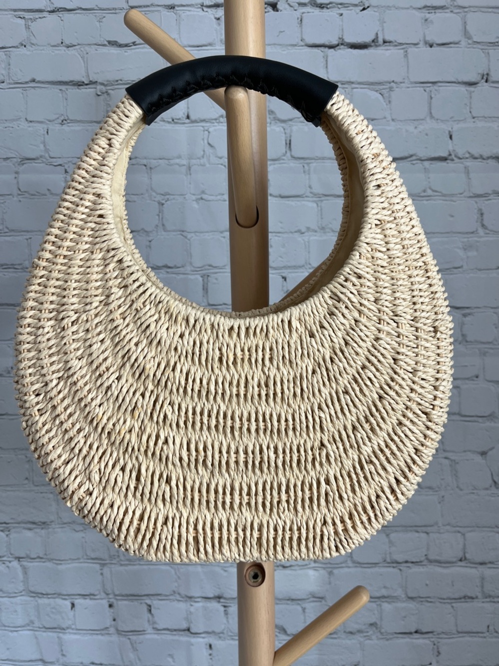 A New Day Round Woven Straw Bag with Black Handle - Picture 2 of 6